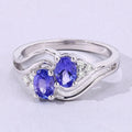 0.88 Ct Oval Violet Tanzanite and Lab Grown Diamond Prong Silver Bypass Ring by Fine Color Jewels