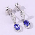 0.88 Ct Oval Violet Tanzanite & Lab Diamond Bezel Silver Dangle Earrings by Fine Color Jewels