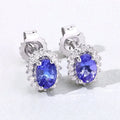 0.88 Ct Oval Violet Tanzanite & Lab Diamond Prong Silver Halo Basket Stud Earrings by Fine Color Jewels