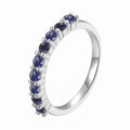 0.9 Ct Round Blue Sapphire Prong Silver Half Eternity Ring by Fine Color Jewels