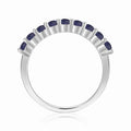 0.9 Ct Round Blue Sapphire Prong Silver Half Eternity Ring by Fine Color Jewels