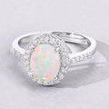 0.90 Ct Oval White Ethiopian Opal and Lab Diamond Prong Silver Halo Pave Ring by Fine Color Jewels
