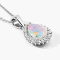 0.90 Ct pear white Ethiopian Opal and Lab Diamond prong Silver Halo teardrop pendant Necklace by Fine Color Jewels