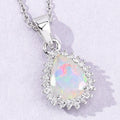 0.90 Ct pear white Ethiopian Opal and Lab Diamond prong Silver Halo teardrop pendant Necklace by Fine Color Jewels