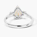 0.90 Ct Pear White Ethiopian Opal and Lab Diamond Prong Silver Three Stone Ring by Fine Color Jewels