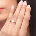 0.90 Ct Pear White Ethiopian Opal and Lab Diamond Prong Silver Three Stone Ring by Fine Color Jewels