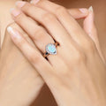 0.90 Ct Teardrop White Ethiopian Opal and Lab Diamond Prong Silver Halo Ring by Fine Color Jewels