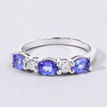 0.99 Ct Oval Violet Tanzanite and Lab Grown Diamond Prong Silver Five Stone Ring by Fine Color Jewels