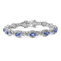 Oval Violet Tanzanite Prong Silver Halo XO Tennis Bracelet by Fine Color Jewels