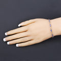 Oval Violet Tanzanite Prong Silver Infinity Bolo Adjustable Bracelet by Fine Color Jewels