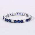 1.01 Ct Round Blue Sapphire and Lab Diamond Prong Silver Eternity Band Ring by Fine Color Jewels