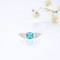 1.05 Ct Cushion Blue Natural Paraiba Apatite Prong Rhodium Plated Sterling Silver Baguette Accents Five Stone Ring by Fine Color Jewels