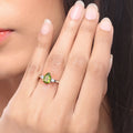 1.10 Ct Pear Green Peridot and Lab Diamond Prong Silver Three Stone Ring by Fine Color Jewels