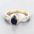 1.14ct Pear Blue Sapphire and Diamond Prong 14K Yellow Gold Crossover Engagement Ring by Fine Color Jewels