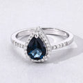 1.15 Ct Pear London Blue Topaz Lab Diamond Prong Silver Halo Pave Bridge Ring by Fine Color Jewels