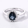 1.15 Ct Pear London Blue Topaz & Lab Diamond Prong Silver Halo Ring by Fine Color Jewels