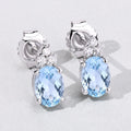 1.20 Ct Oval Blue Aquamarine & Lab Diamond Prong Silver Stud Earrings by Fine Color Jewels