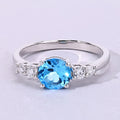 1.20 Ct Round Swiss Blue Topaz and Lab Diamond Prong Silver Five Stone Ring by Fine Color Jewels