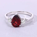 1.30 Ct Pear Red Mozambique Garnet and Lab Diamond Prong Silver Three Stone Ring by Fine Color Jewels