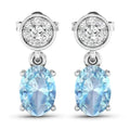 1.40 Ct Oval Blue Aquamarine & Diamond Prong 14K White Gold Dangle Earrings by Fine Color Jewels