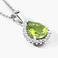1.46 Ct pear green Peridot and Lab Diamond prong Silver Halo teardrop pendant Necklace by Fine Color Jewels