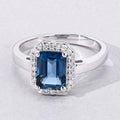 1.60 Ct Octagon London Blue Topaz and Lab Diamond Prong Silver Halo Ring by Fine Color Jewels