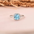 1.75 Ct Cushion Natural Blue Topaz Prong Rhodium Over Silver Halo Ring by Fine Color Jewels