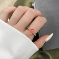 1.80 Ct Pear Lab Created Peach Sapphire and Moissanite Prong Silver Pave-set Ring by Fine Color Jewels