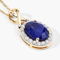 1.88 Ct Genuine Oval Ceylon Blue Sapphire and Diamond 18K Yellow Gold Crossover Pendant by Fine Color Jewels