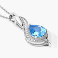 1.90 Ct Pear Swiss Blue Topaz & Lab Diamond Prong Silver Teardrop Crossover Pendant Necklace by Fine Color Jewels