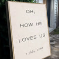 1 John 4:9-10 Oh How He Loves Us Faith Sign II by Tailored Canvases