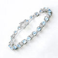 11 Ct Heart Blue Topaz Prong Silver Tennis Bracelet by Fine Color Jewels