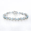 11 Ct Heart Blue Topaz Prong Silver Tennis Bracelet by Fine Color Jewels