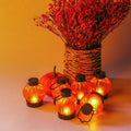 12-Pack: LED Pumpkin Tealights Smokeless Candles by DailySale