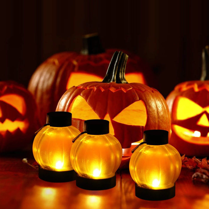 12-Pack: LED Pumpkin Tealights Smokeless Candles by DailySale