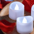 12-Pieces: LED Tealight Candle with 100-Pieces Fake Rose Petals by DailySale