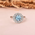 Natural Blue Topaz Round Halo Ring by Fine Color Jewels