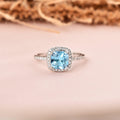 1.75 Ct Cushion Natural Blue Topaz Prong Rhodium Over Silver Halo Ring by Fine Color Jewels