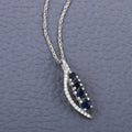 14K White Gold Blue Sapphire And Diamond Necklace by Fine Color Jewels