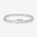 Heart Blue Topaz & Diamond Prong Silver Tennis Bracelet by Fine Color Jewels
