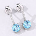 2.10 Ct Round Swiss Blue Topaz & Lab Diamond Prong Silver Dangle Earrings by Fine Color Jewels