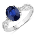 2.18 Ct Oval Ceylon Blue Sapphire and White Diamond Prong 18K White Gold Pave Crossover Engagement Ring by Fine Color Jewels