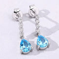 2.30 Ct Pear Swiss Blue Topaz & Lab Diamond Prong Silver Teardrop Dangle Earrings by Fine Color Jewels