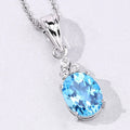 2.55 Ct oval Swiss Blue Topaz and Lab Diamond prong Silver Cocktail pendant Necklace by Fine Color Jewels