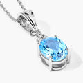 2.55 Ct oval Swiss Blue Topaz and Lab Diamond prong Silver Cocktail pendant Necklace by Fine Color Jewels