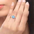 2.55 Ct Oval Swiss Blue Topaz & Lab Diamond Prong Silver Bridge Ring by Fine Color Jewels