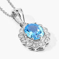 2.55 Ct Oval Swiss Blue Topaz & Lab Diamond Prong Silver Halo Floral Pendant Necklace by Fine Color Jewels