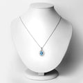 2.55 Ct Oval Swiss Blue Topaz Lab Diamond Prong Silver Halo Pendant Necklace by Fine Color Jewels