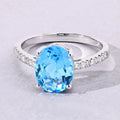 2.55 Ct Oval Swiss Blue Topaz & Lab Diamond Silver Pave Bridge Ring by Fine Color Jewels