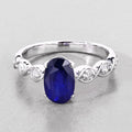 2.57 Ct Oval Ceylon Blue Sapphire and White Diamond Prong 18K White Gold Crossover Wedding Ring by Fine Color Jewels